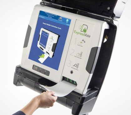 Voter using and ExpressVote.